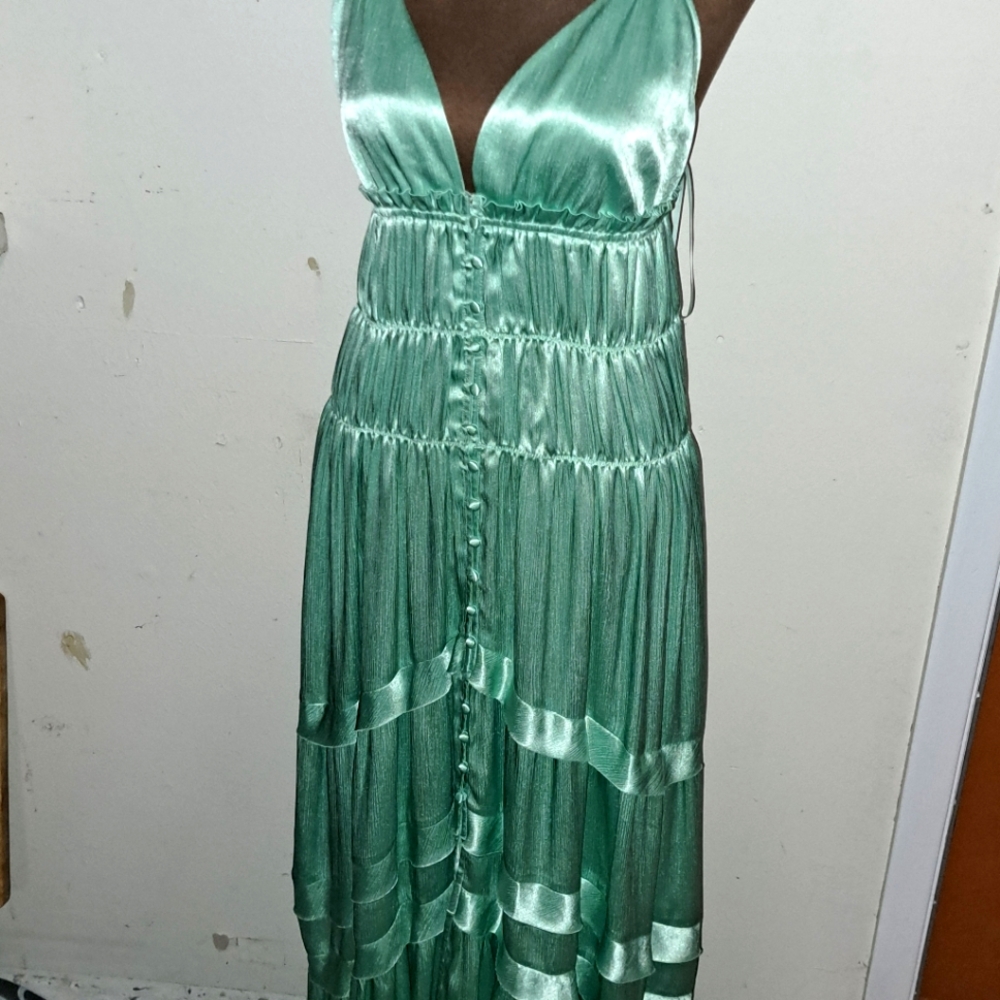 Dress for women and young girls. It is new bright pastel green color .